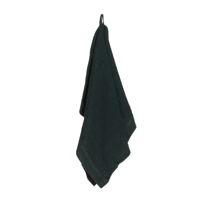 Rento Kenno Hand towel in dark green hanging on hook