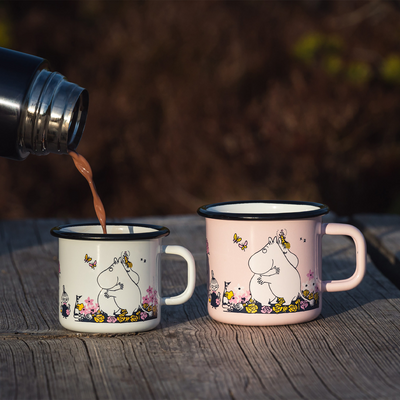 Pouring coffee into Muurla Moomin Enamel Mug Hug