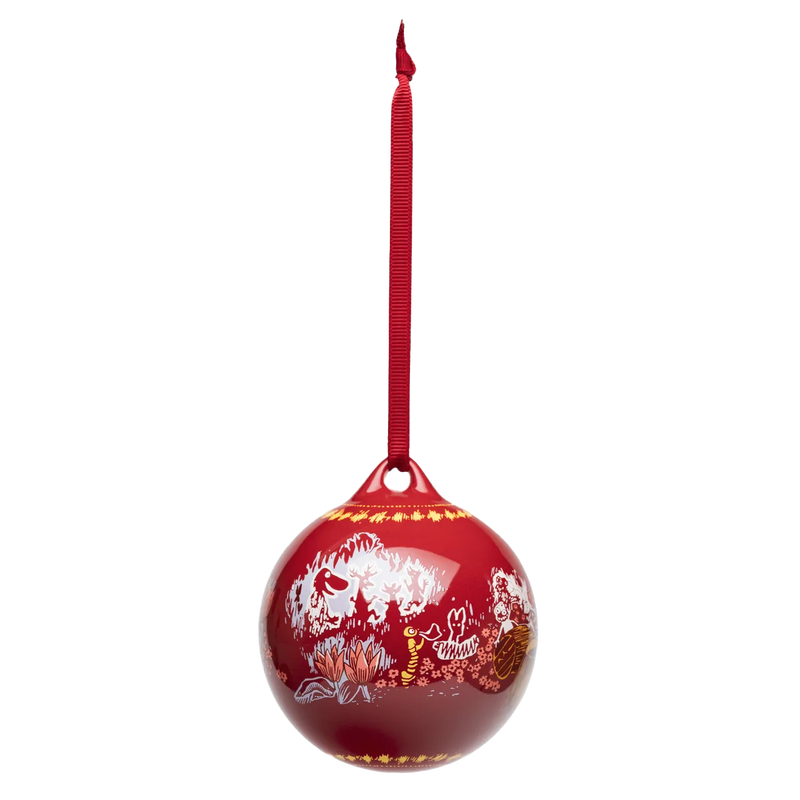 Red Christmas ornament with white designs on a white background