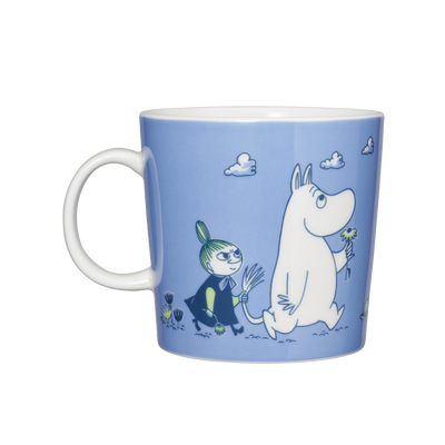 Blue mug with cartoon characters on a white background