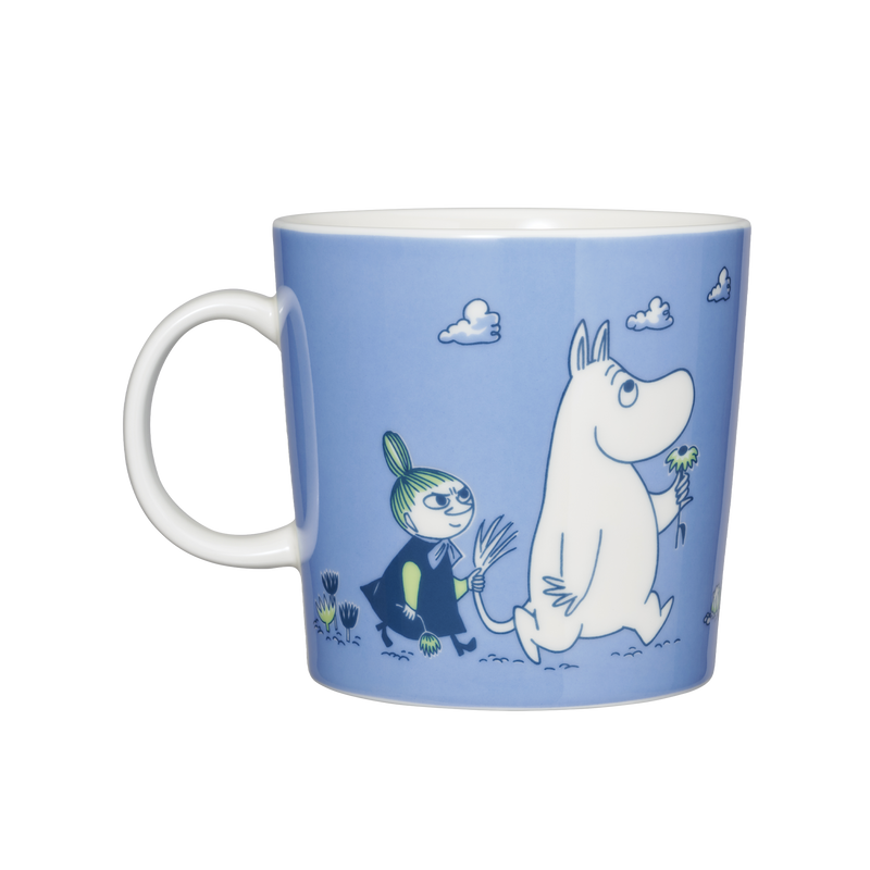 Blue mug with cartoon characters on a white background