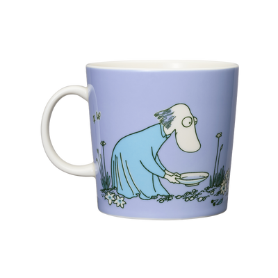 Mug with a cartoon character design on a light purple background