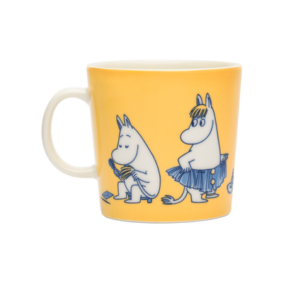 Moomin mug with two characters on a yellow background