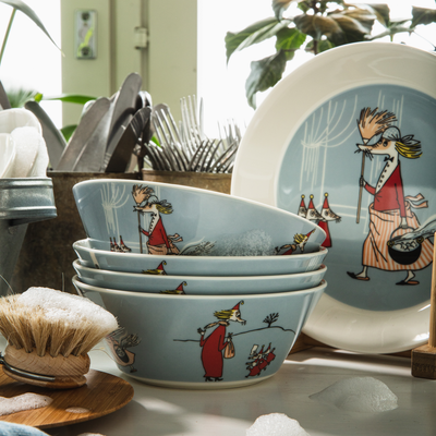 Set of bowls with cartoon character design on a kitchen counter.