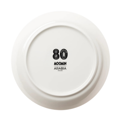 White ceramic plate with Moomin Arabia logo on a white background