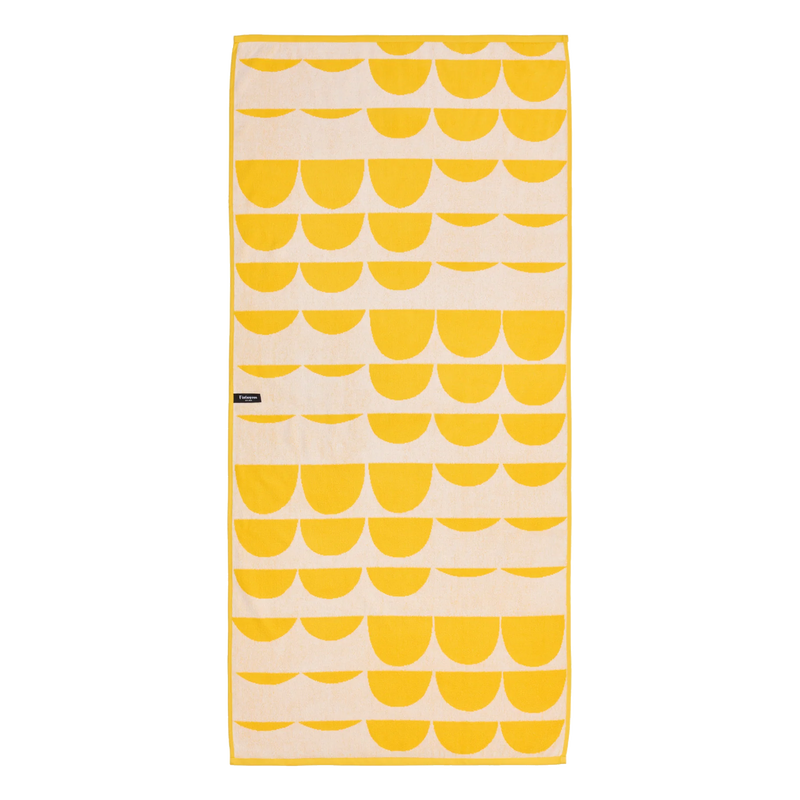 Towel with yellow and beige pattern on a white background