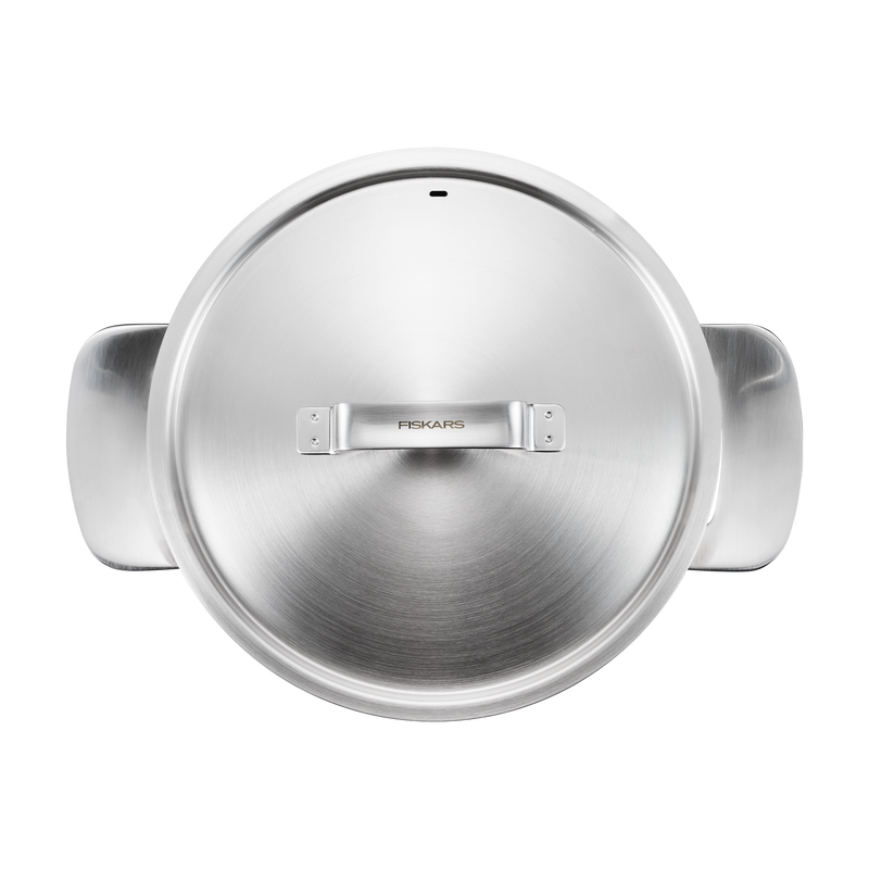 Stainless steel lid with Fiskars logo on a white background