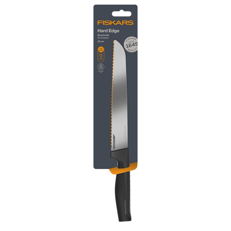 Fiskars bread knife with packaging on a white background
