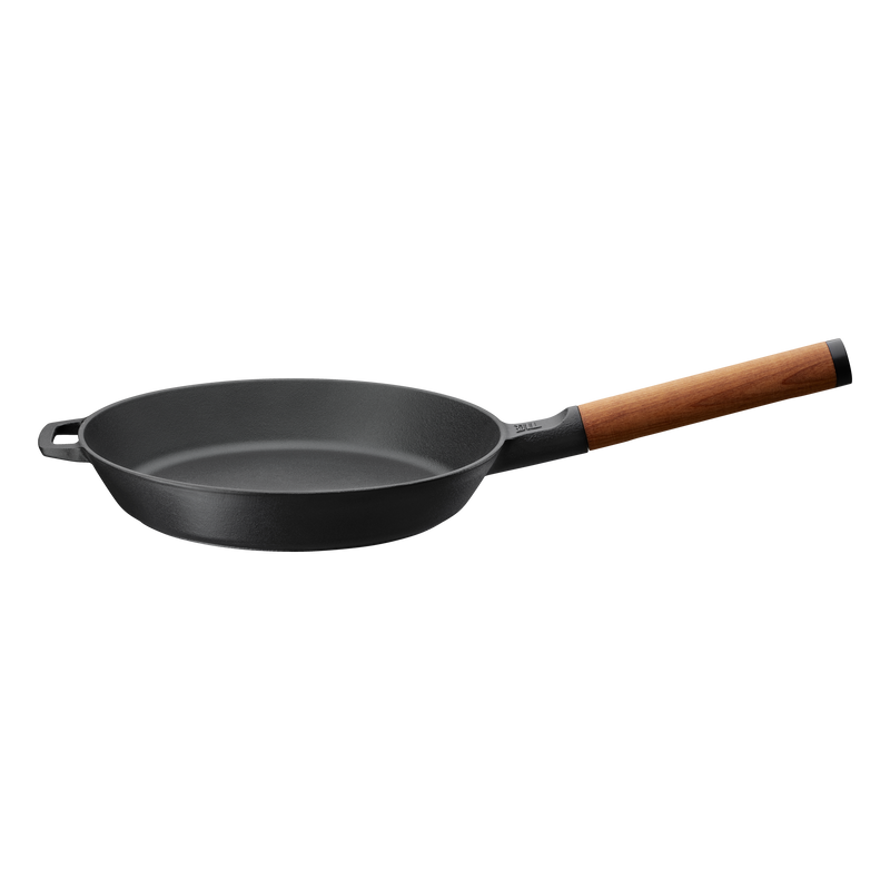 Black frying pan with a wooden handle on a white background