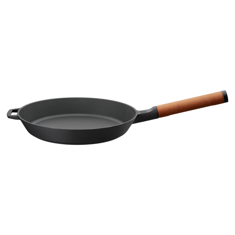 Black frying pan with a wooden handle on a white background