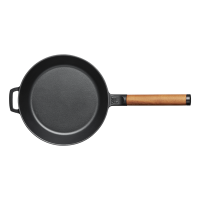 Black frying pan with a wooden handle on a white background