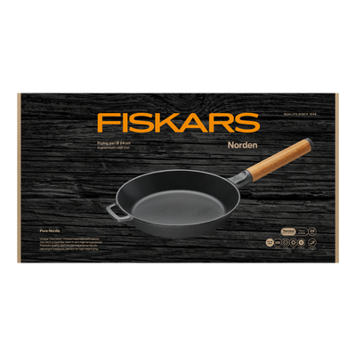 Fiskars frying pan packaging with a black background