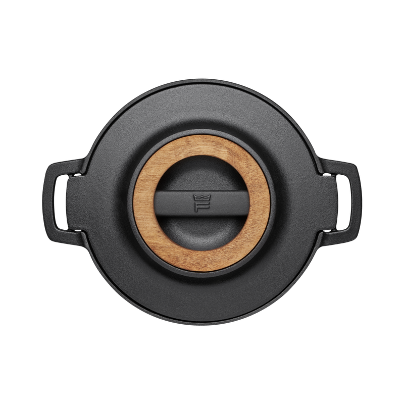 Black lid with wooden center and handles on a white background