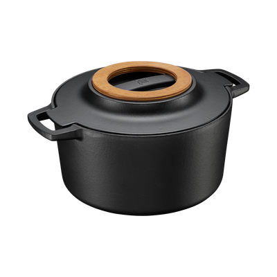 Black pot with a wooden lid on a white background