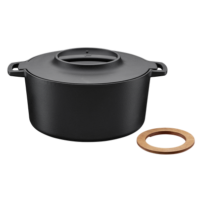 Black pot with a wooden ring on a white background