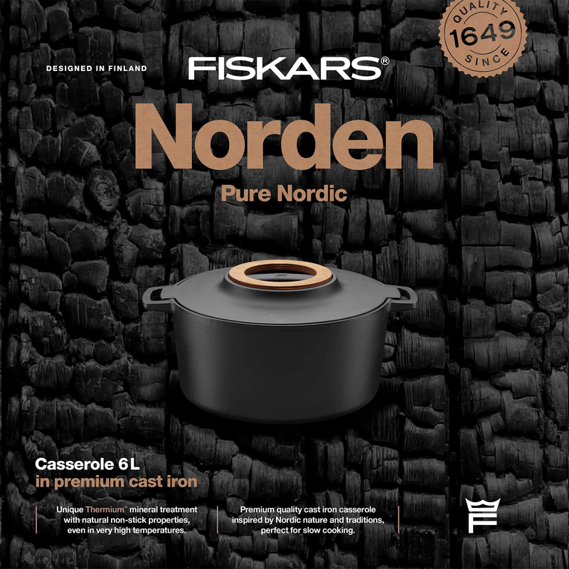 Fiskars Norden casserole dish packaging with product and brand details on a textured black background.
