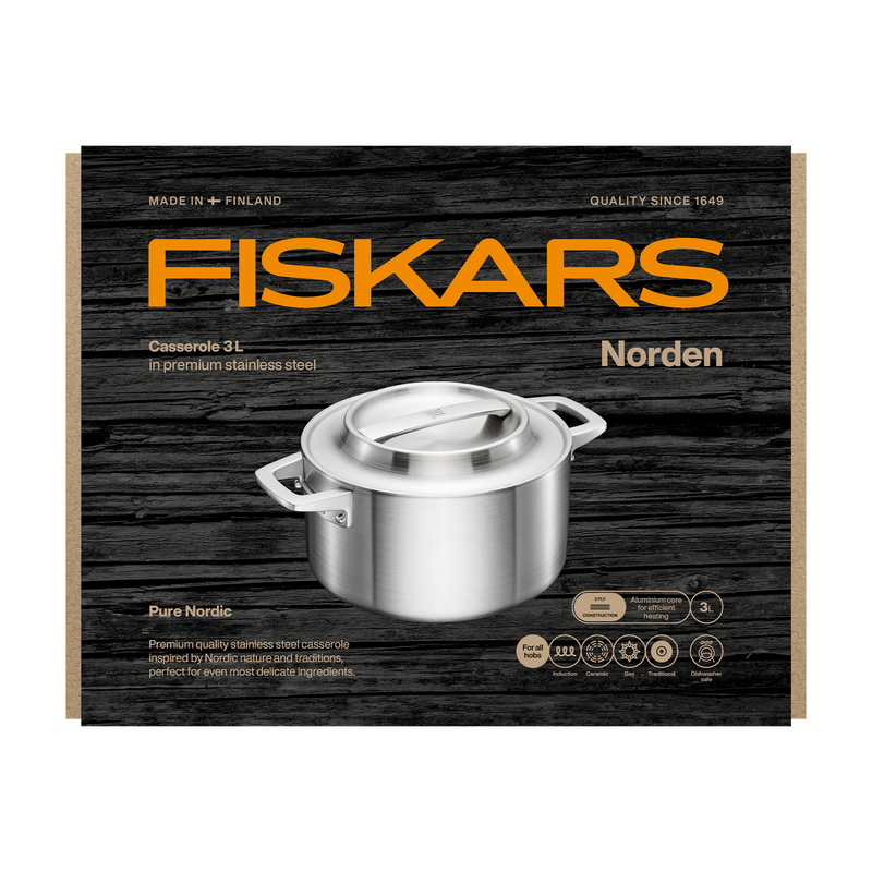 Fiskars Norden stainless steel casserole on a wooden-textured packaging background