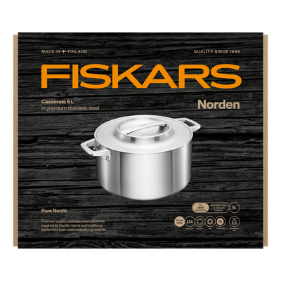 Fiskars Norden stainless steel casserole dish packaging on a wooden background