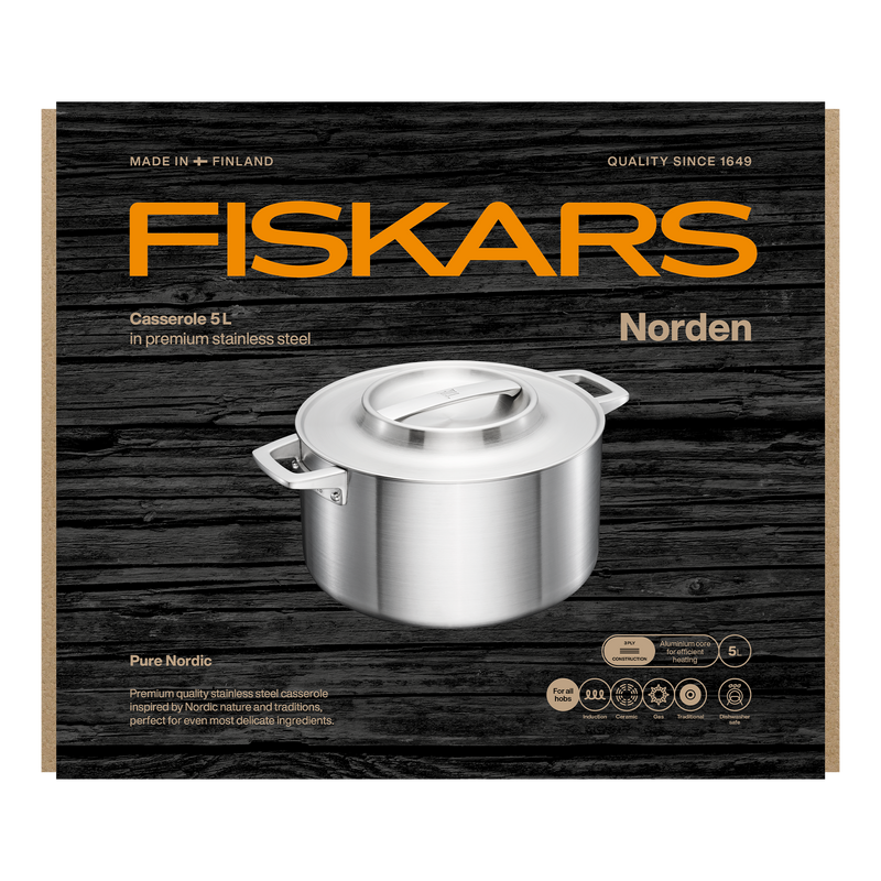 Fiskars Norden stainless steel casserole dish packaging on a wooden background