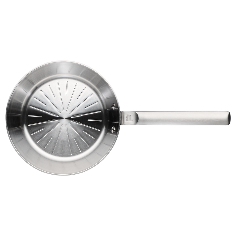Stainless steel frying pan on a white background