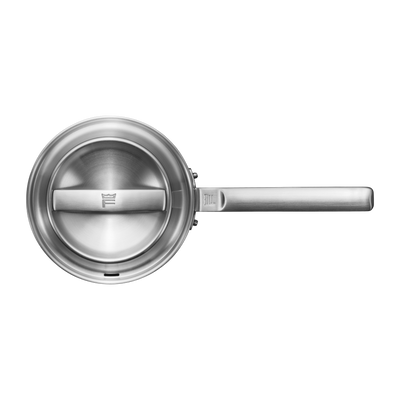 Stainless steel frying pan on a white background
