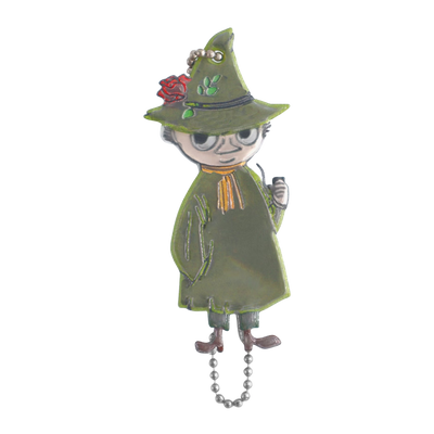Decorative witch figurine with green hat and cloak on a white background