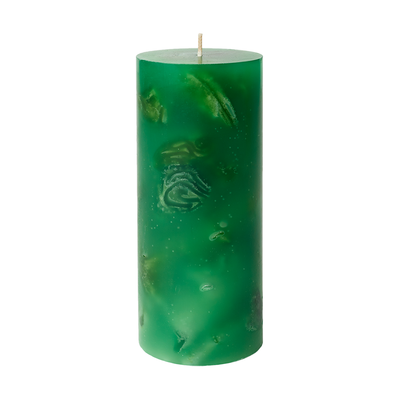 Green candle with embossed design on a white background