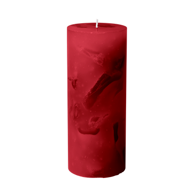 Red candle on a white background