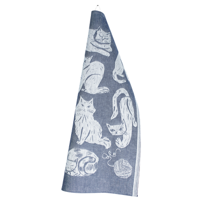 Blue towel with white cat illustrations on a white background