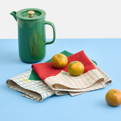 Marimekko Kalendi & Losange Kitchen Towels folded on table