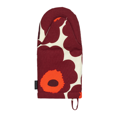 Floral-patterned oven mitt with red, orange, and white design on a white background