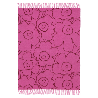 Pink floral patterned throw blanket on a white background