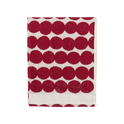 Red and white patterned towel on a white background