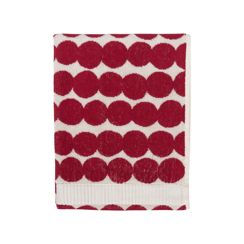 Red and white patterned towel on a white background