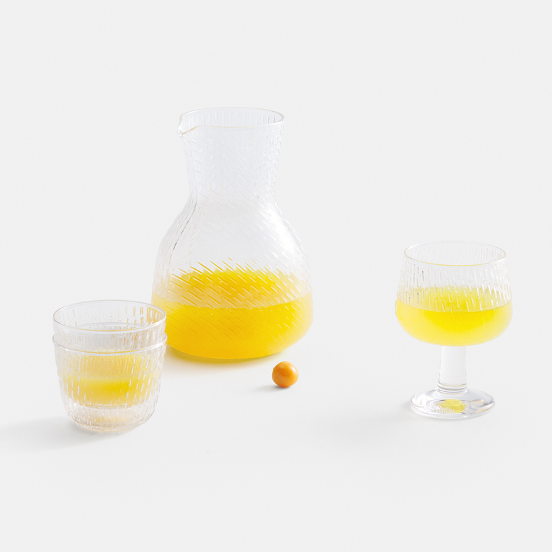 table setting of Marimekko Syksy Clear Glass with orange juice