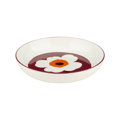 Round plate with a floral design on a white background