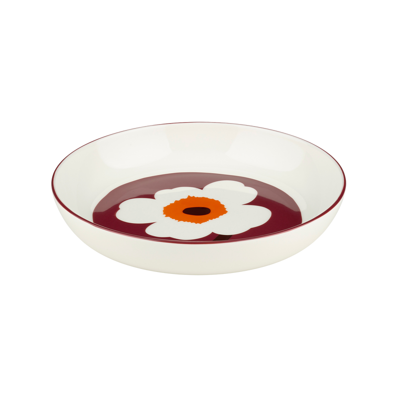Round plate with a floral design on a white background