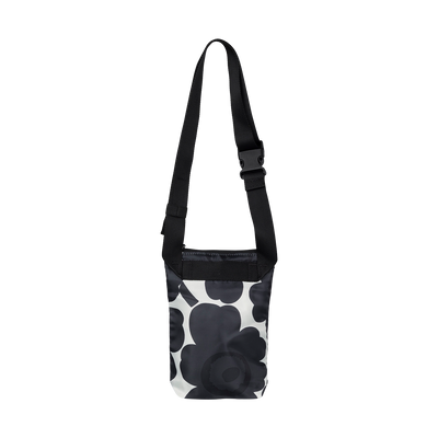 Black and white floral patterned bag with a strap on a white background