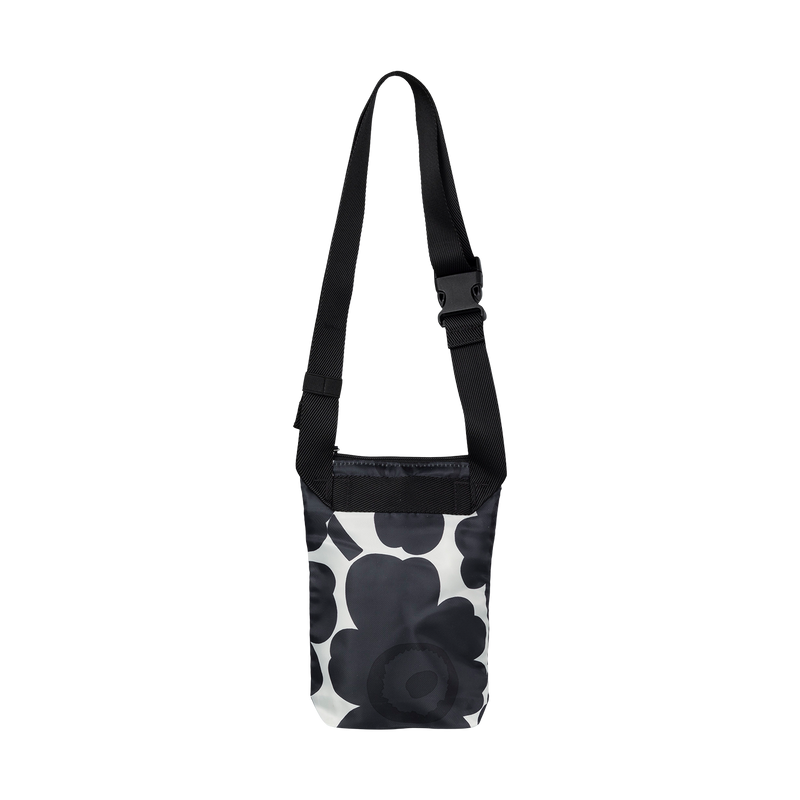 Black and white floral patterned bag with a strap on a white background