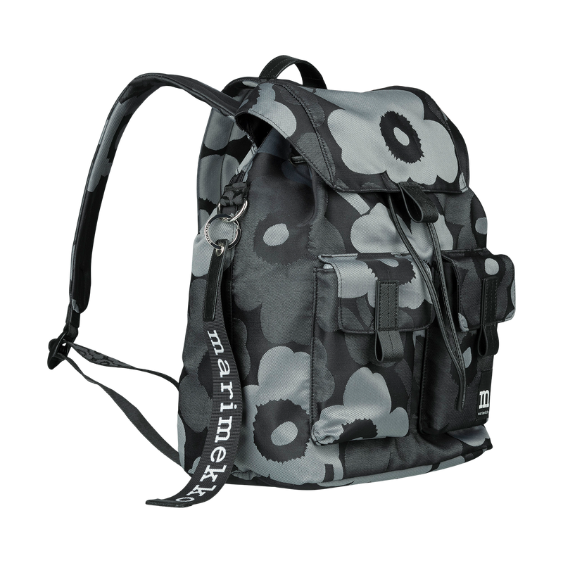 Black and gray floral-patterned backpack with visible brand name on a white background