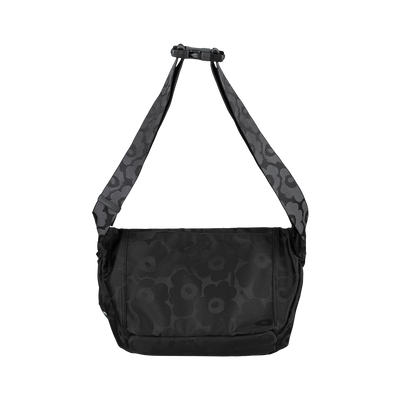 Black floral-patterned shoulder bag on a white background
