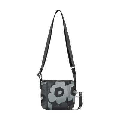 Floral patterned shoulder bag on a white background