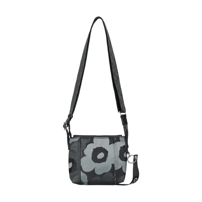 Floral patterned shoulder bag on a white background