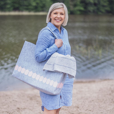 Woman at beat with Muurla Vappu Shopping Tote Bag on shoulder