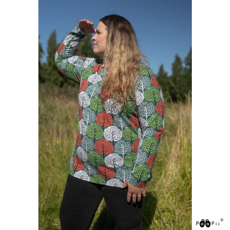 Woman exploring a field wearing PaaPii Aava Shirt 