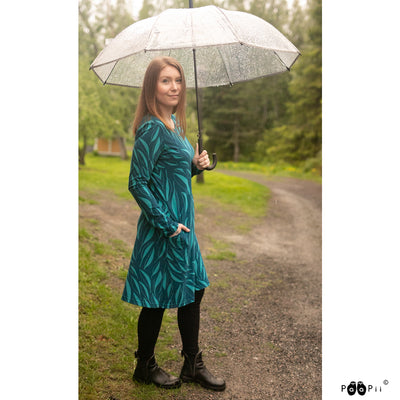 Woman smiling wearing PaaPii Sini Dress Flow in rain 