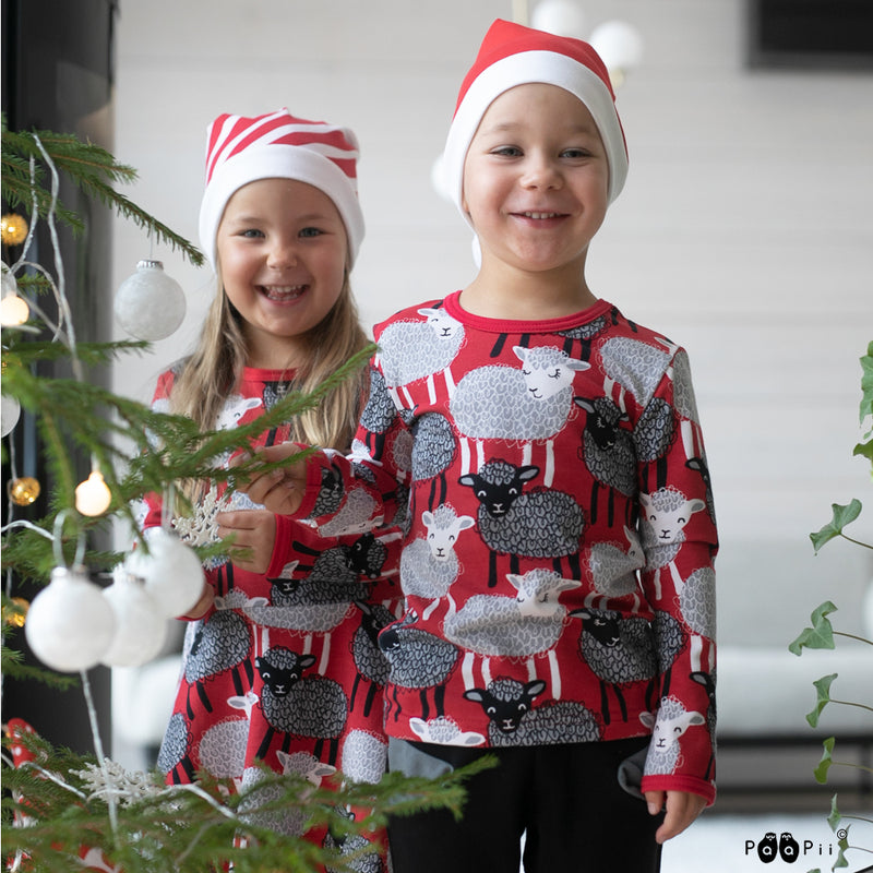 Two kids wearing PaaPii Baa pattern clothing