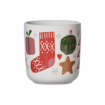White mug with colorful Christmas-themed designs on a white background