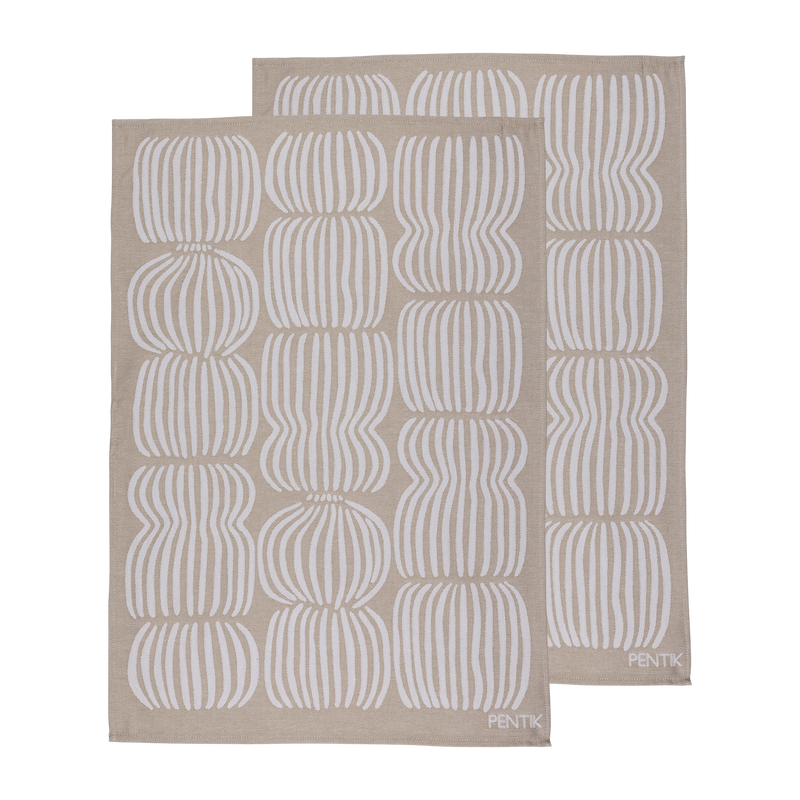 Two beige placemats with white geometric pattern on a white background, featuring the brand &