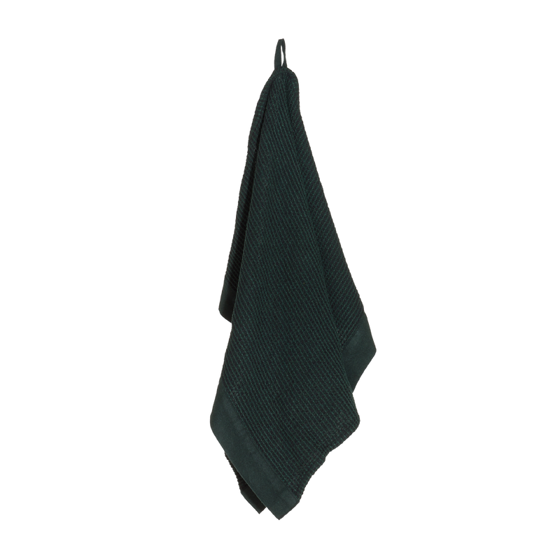 Rento Kenno Hand towel in dark green hanging on hook